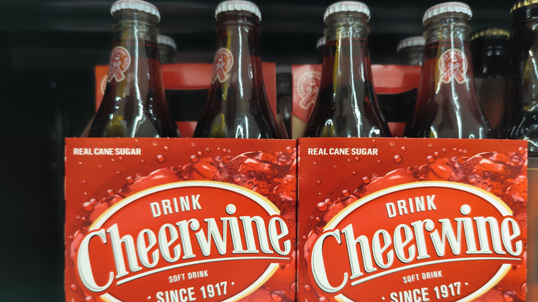 Bottles of Cheerwine in red boxes
