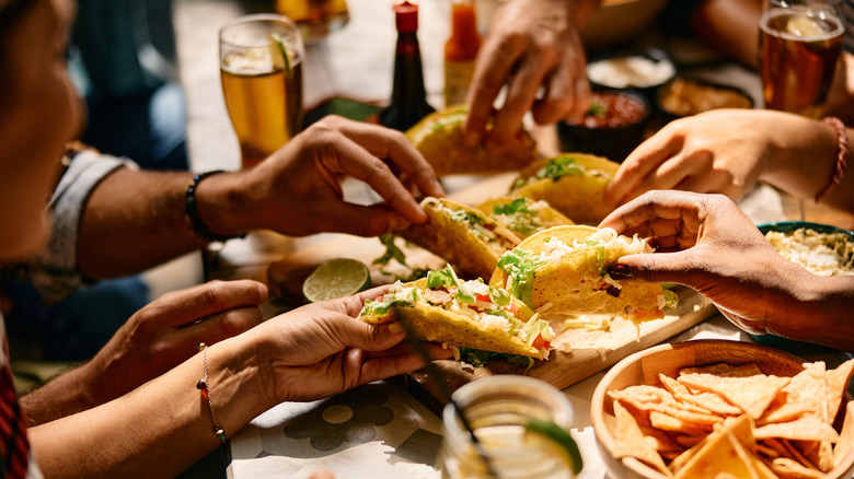 Friends sharing Mexican meal