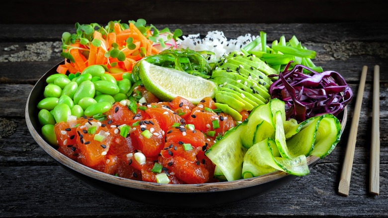 Watermelon tuna on plate with fresh vegetables