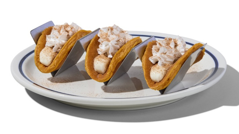 Three Pumpkin Cheesecake Taco Pancakes from IHOP on white plate