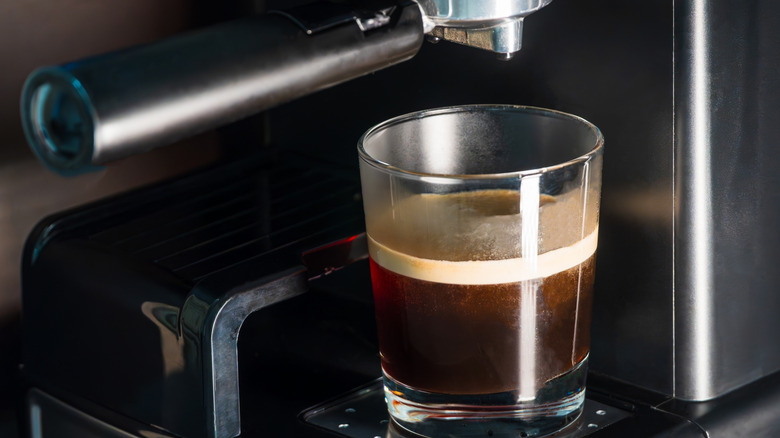 Espresso machine preparing coffee