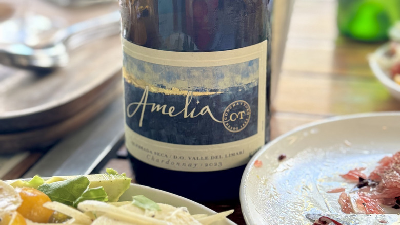 Bottle of Amelia chardonnay with food