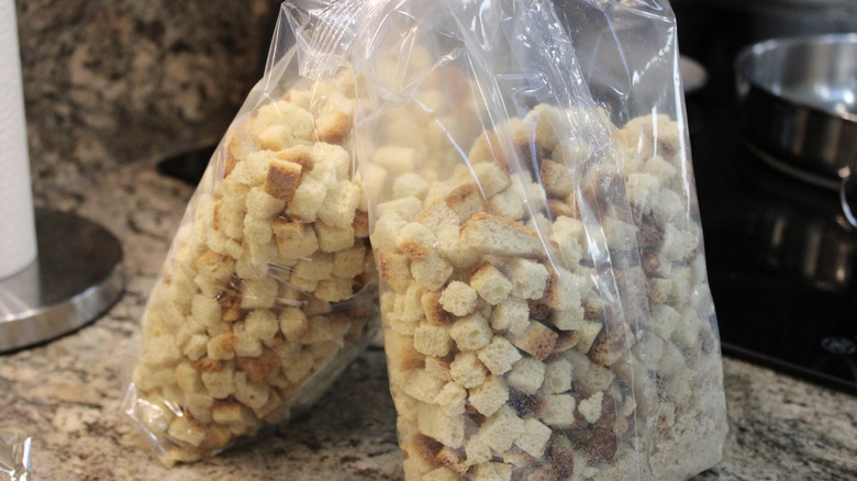 Bags of stuffing on a kitchen counter.