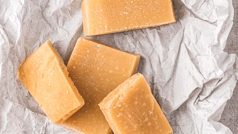 Parmesan rinds on white paper