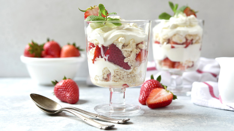Eton Mess desserts garnished with mint leaves