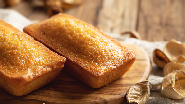 Mini pound cakes on cutting board.