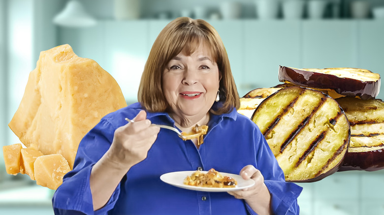 Ina Garten eating eggplant parm with grilled eggplant and parmesan cheese in the background