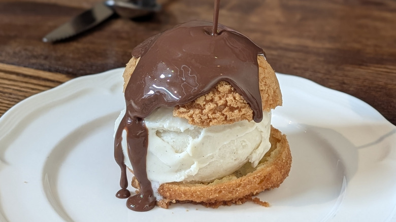 Profiteroles with vanilla ice cream and chocolate sauce