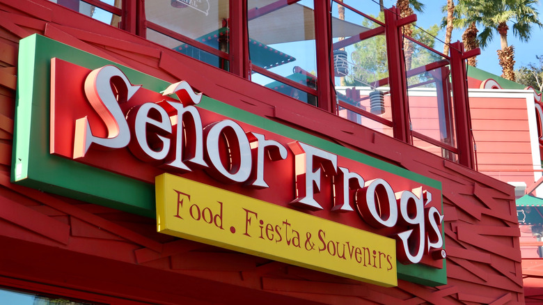 Red, white, and yellow Se&ntilde;or Frog's sign