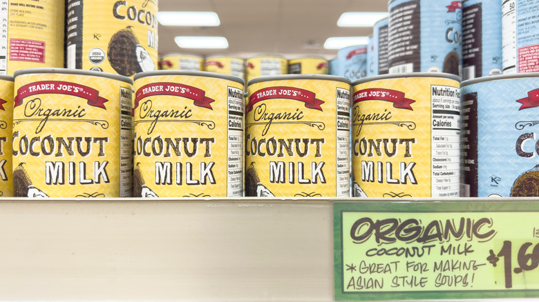 Cans of organic coconut milk