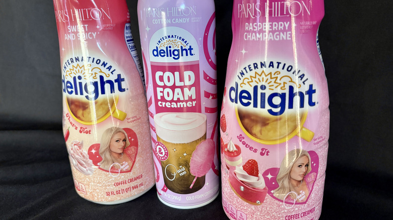 three International Delight creamer bottles