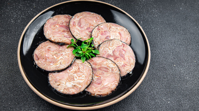 Andouille sausage slices on plate