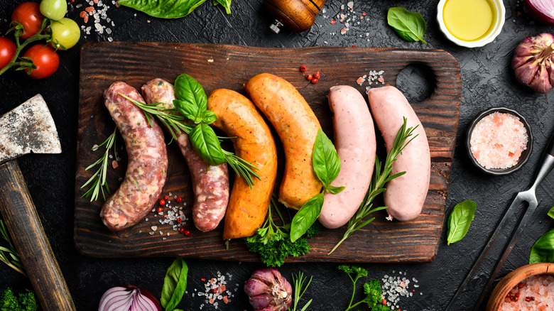 Variety of sausages on cutting board