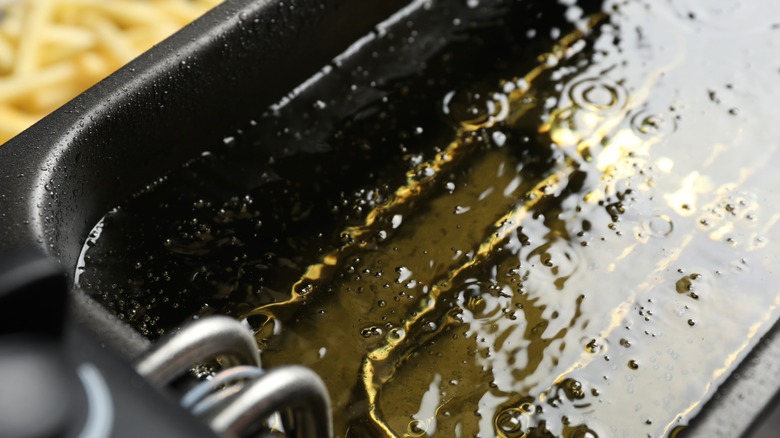Cooking oil in deep fryer closeup