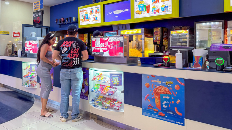 People buying concessions at a movie theater