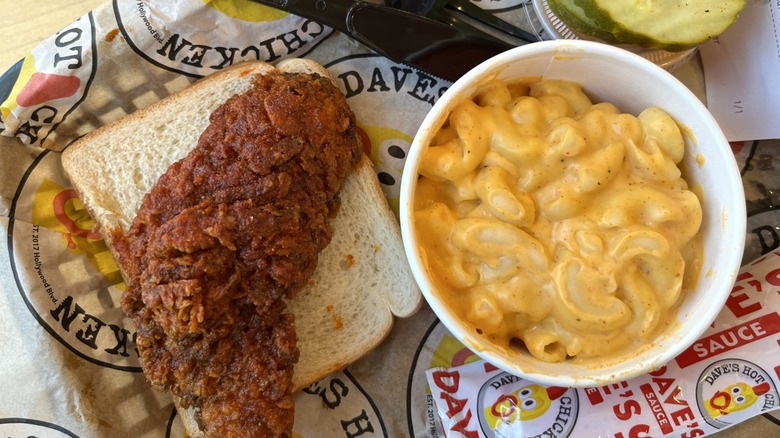 Dave's Hot Chicken tender with mac and cheese in tray