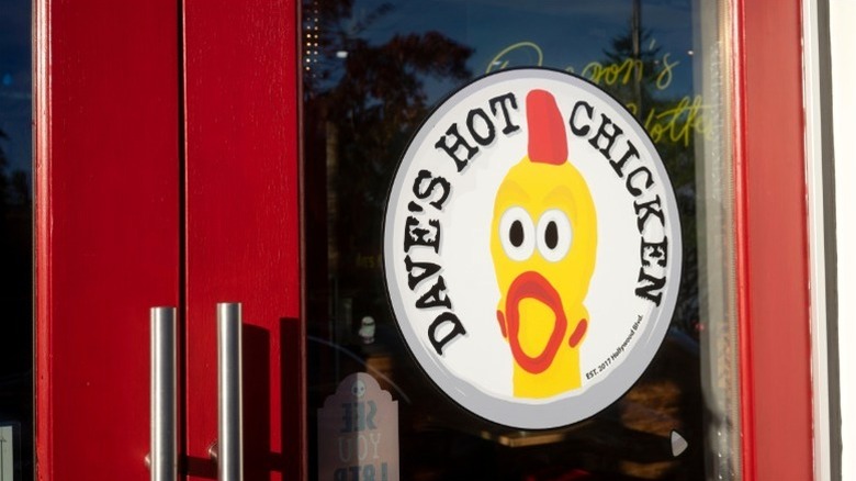 Dave's Hot Chicken entrance with restaurant logo
