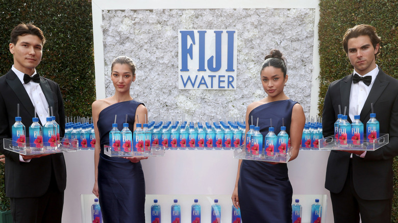 Fiji Water presented on trays at gala