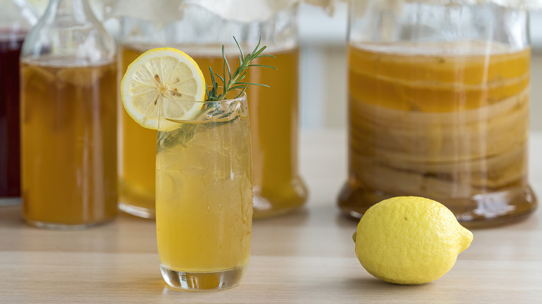 Homemade kombucha on a wooden table.
