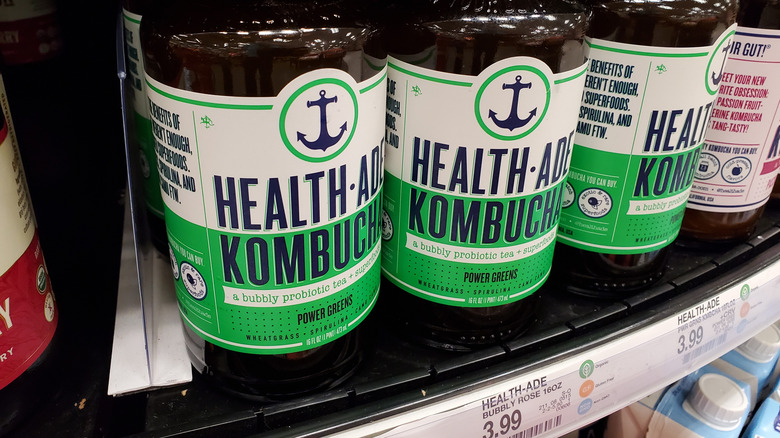 A shelf of Health-Ade kombucha