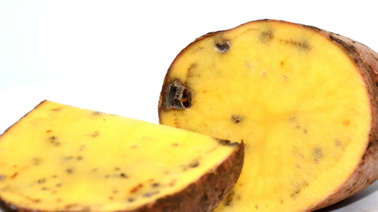 Brown spots inside a cut-up potato