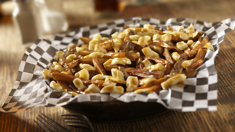 poutine in paper-lined basket