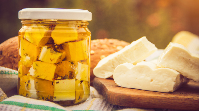 Jar of marinated feta cheese