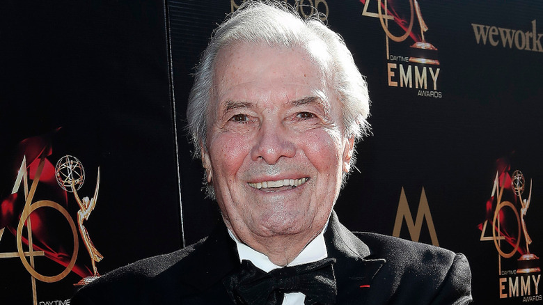 Jacques Pépin smiles in a tuxedo at the Emmys
