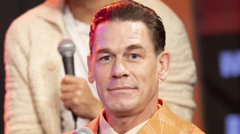John Cena smiling on the camera.