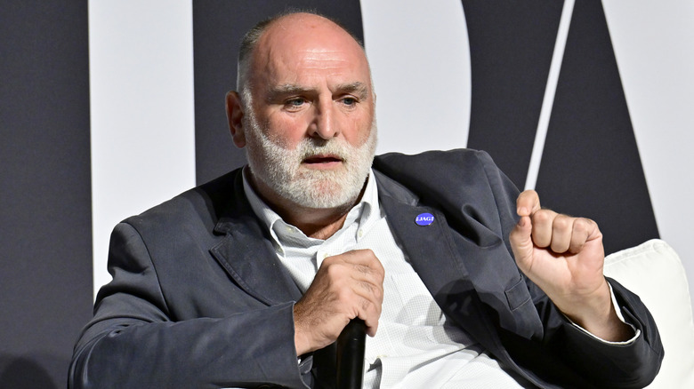 José Andrés holding a microphone