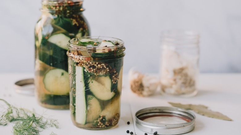 Homemade pickle chips in jars.