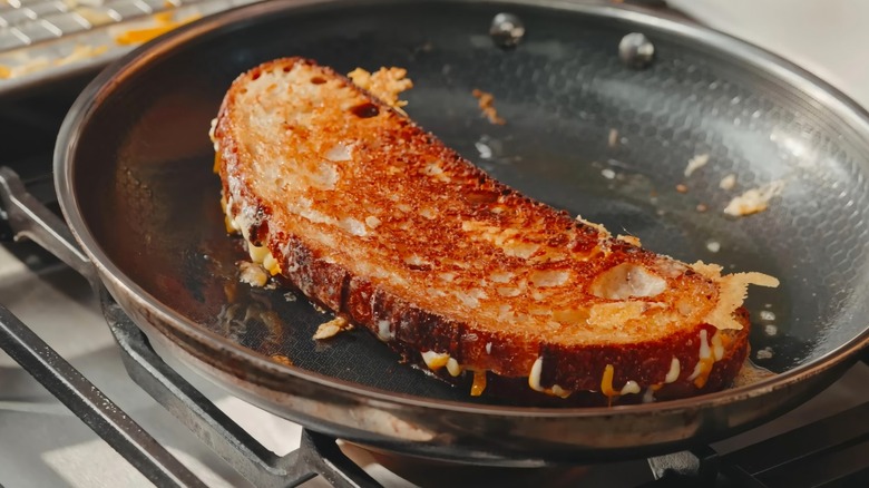 Grilled cheese sandwich in frying pan