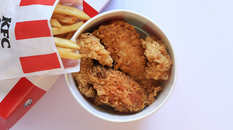 Top view of bucket of KFC fried chicken and fries