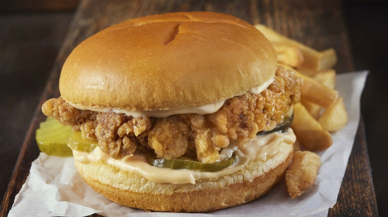Fried chicken sandwich with french fries
