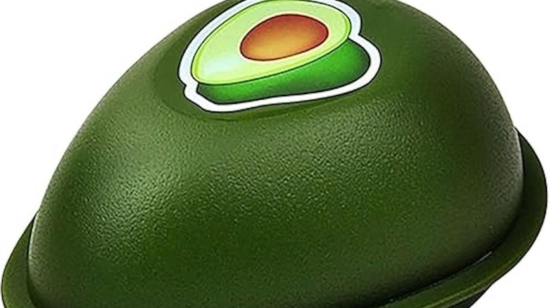 A green avocado saver pod