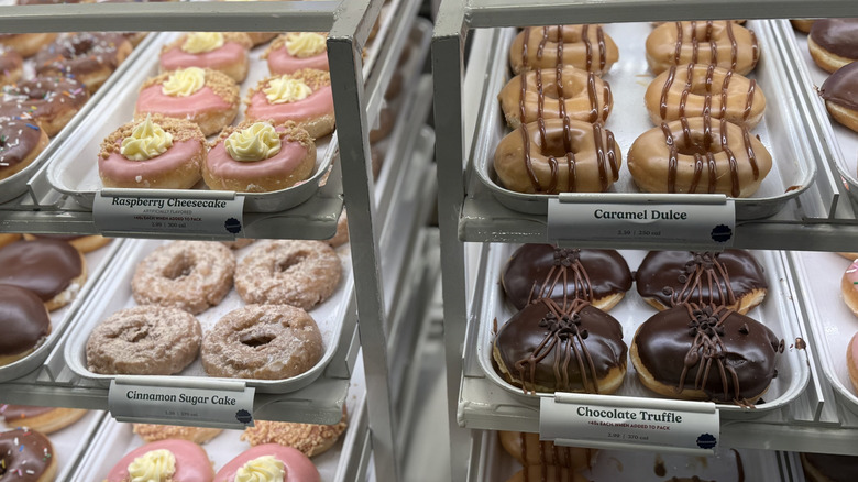 racks of the new Krispy Kreme Winter Seasonal Doughnuts