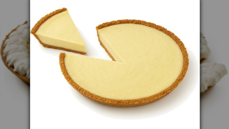 unwrapped Private Selection Key Lime Pie with one slice slightly separated from the rest of the pie