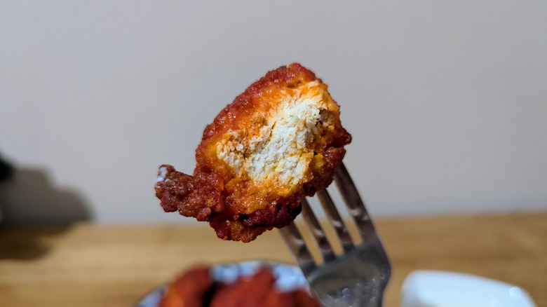 half bitten boneless flamin hot wing