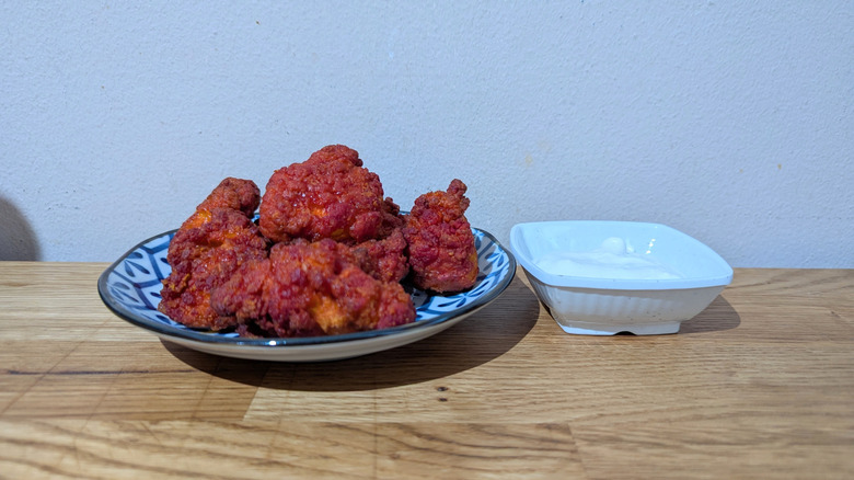 flamin hot boneless chicken wings with blue cheese dressing