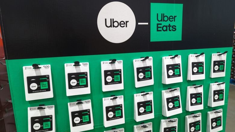 Uber Eats Gift Cards at Costco hanging on display in several rows