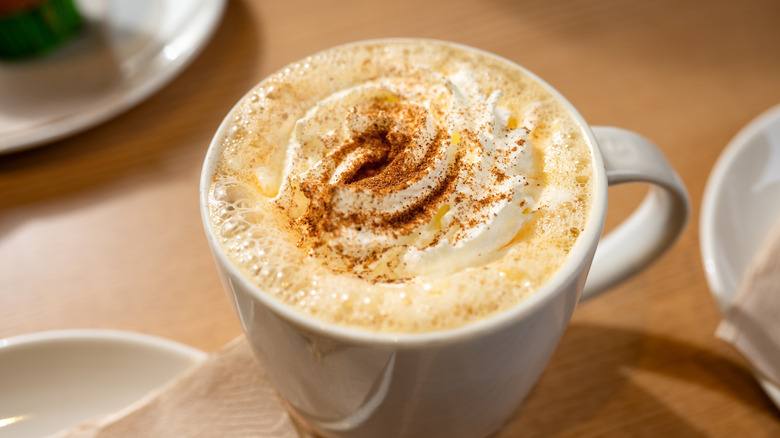 A pumpkin spice latte in a mug.