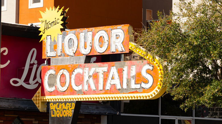 Orange and white marquee for Atomic Liquor