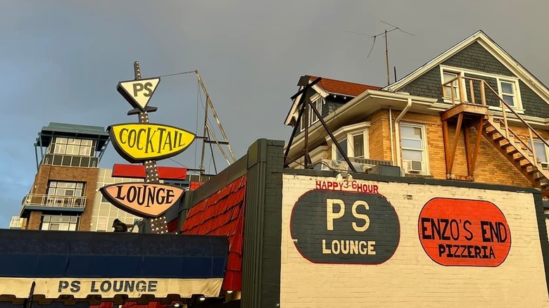 Jetsons style PS Cocktail Lounge sign outside the Denver bar