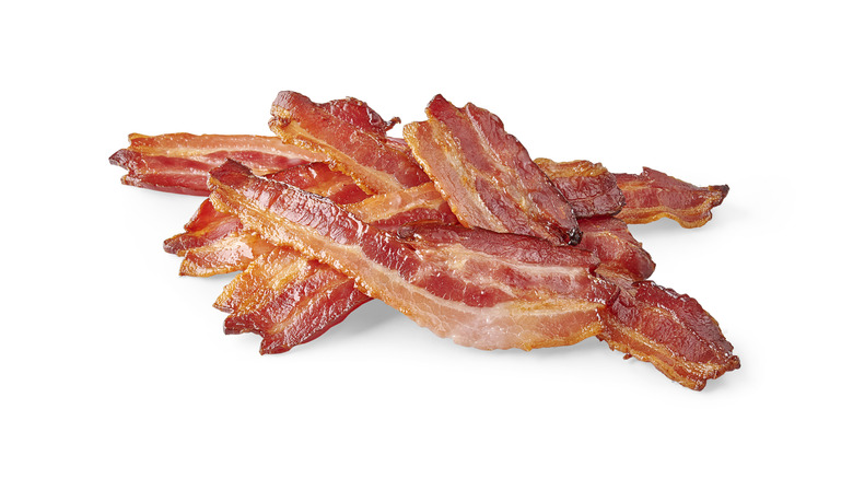 Slices of bacon on a white background