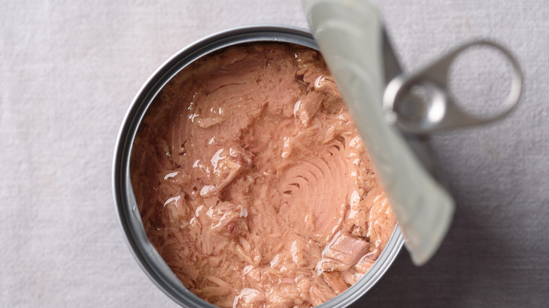 An opened can of tuna fish