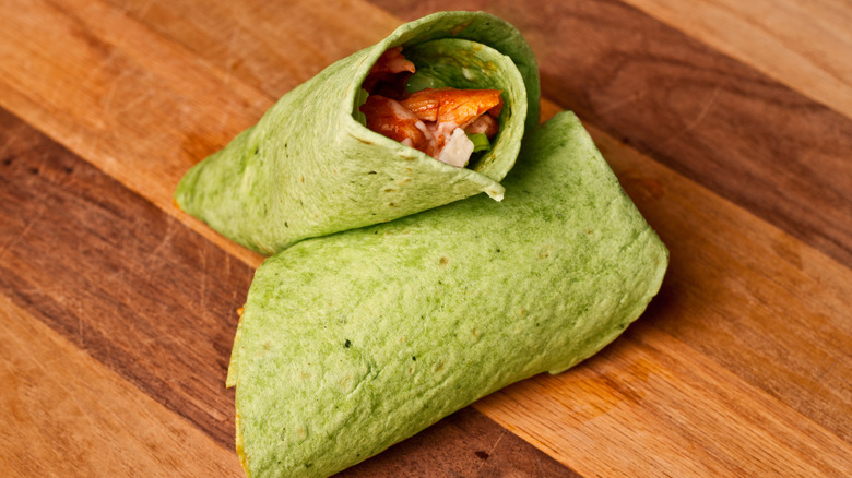 Spinach wrap sandwich on a table