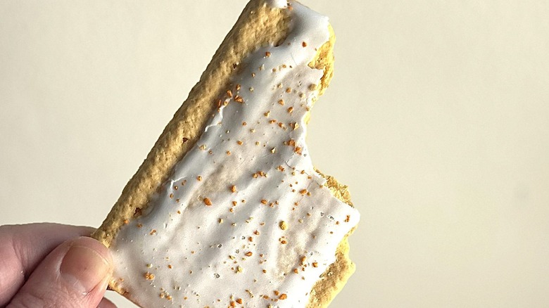 Liquid Death Squeezed to Death Orange Pop-Tart with a bite taken out
