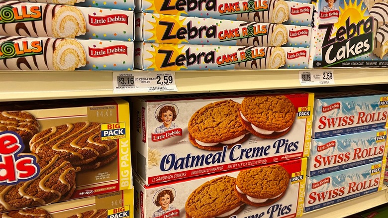 Various Little Debbie snacks on grocery store shelf