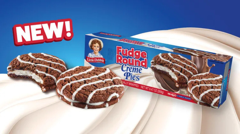 Little Debbie Fudge Round Creme Pies box on a graphic design background of a swirl of cream.