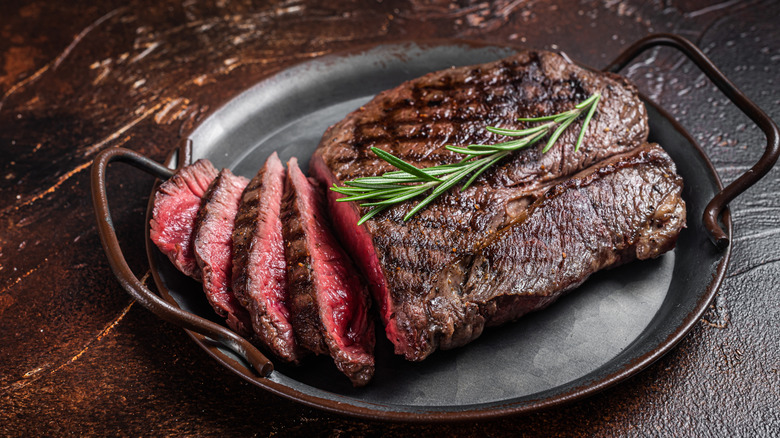 A rare steak, served and ready to eat